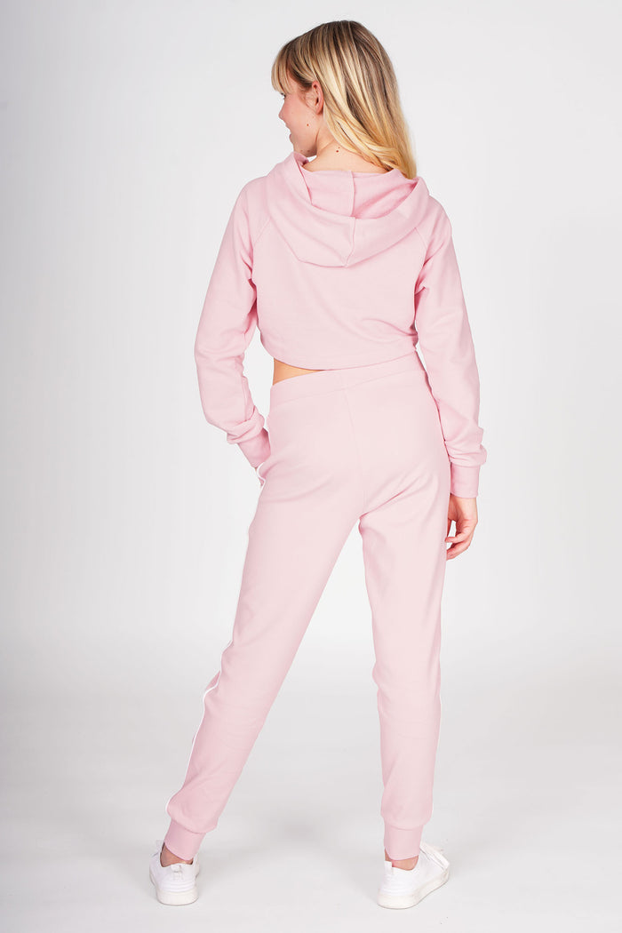 Girl wearing Pink Stripe Pocket Joggers and pink embossed crop hoodie top
