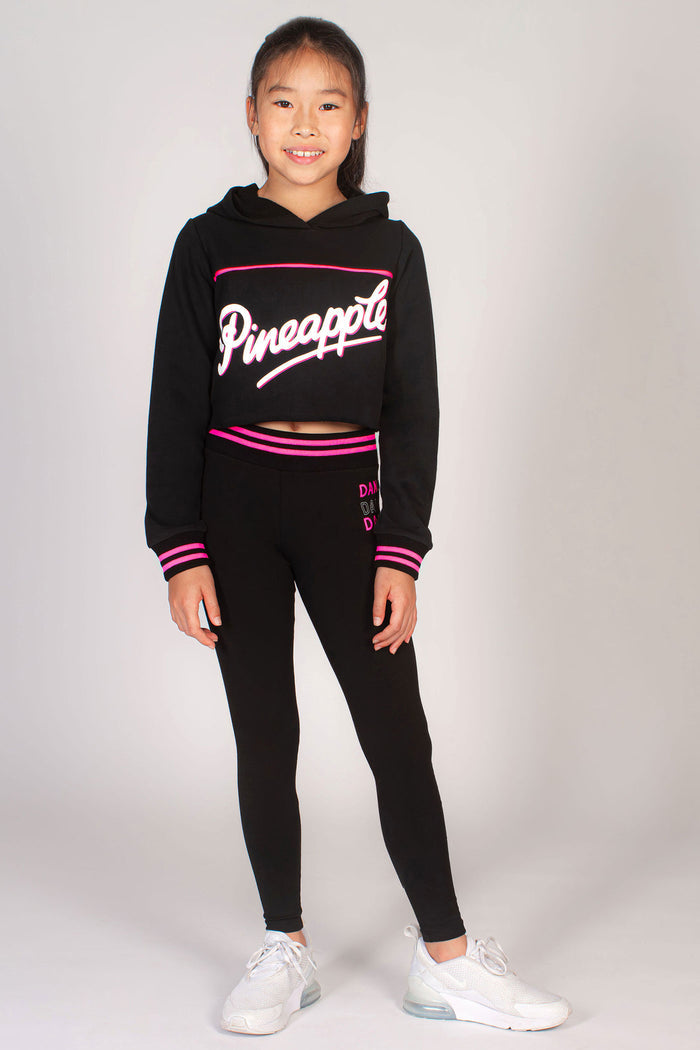 Neon pink and black matching dance set for girls from Pineapple Dance Studios.