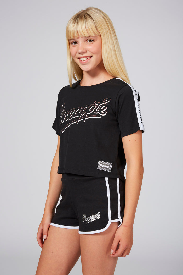 Girl wearing Pineapple Logo Black Shorts with Contrast Stripes, Piping