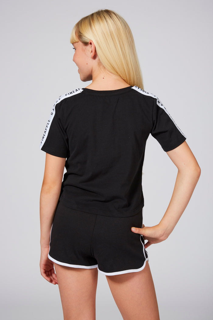 Girl wearing Pineapple Logo Black Shorts with Contrast Stripes, Piping