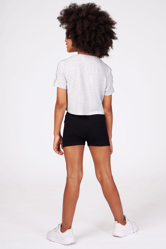 Girl wearing Black Jacquard Hot Pants with grey crop t-shirt