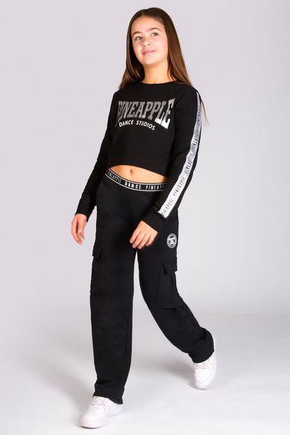 Pineapple sweat top with glitter tape along the sleeves designed by Pineapple Dance Studios