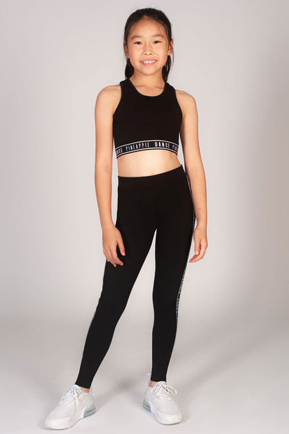 Black crop top in stretchy breathable fabric for girls designed by Pineapple Dance Studios