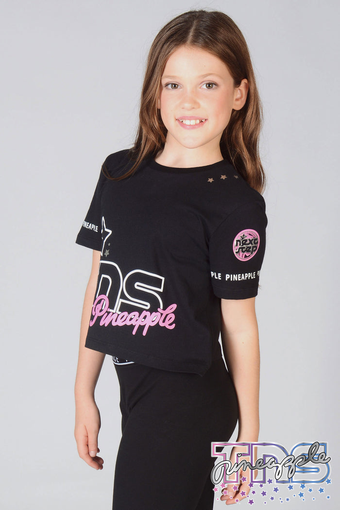 Girl wearing black The Next Step Crop T-Shirt with matching Pineapple leggings in black.