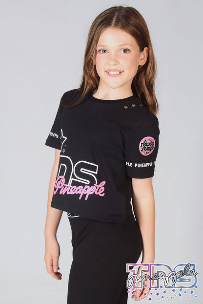 Girl wearing black The Next Step Crop T-Shirt with matching Pineapple leggings in black.