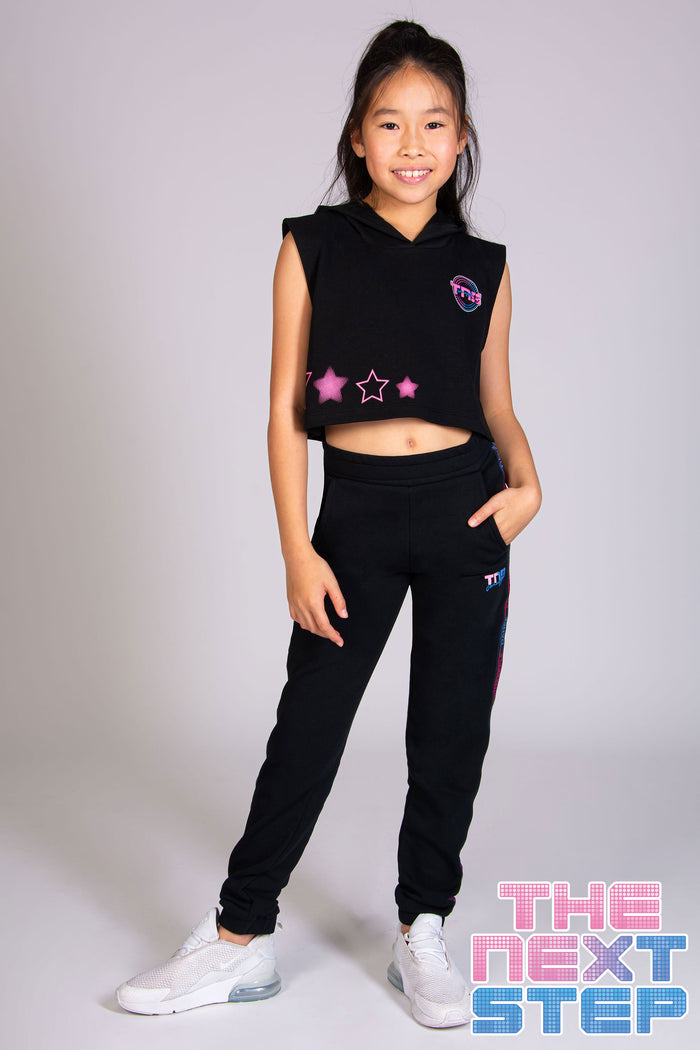 Black sleeveless hoodie for kids with The Next Step TV show branding and logo