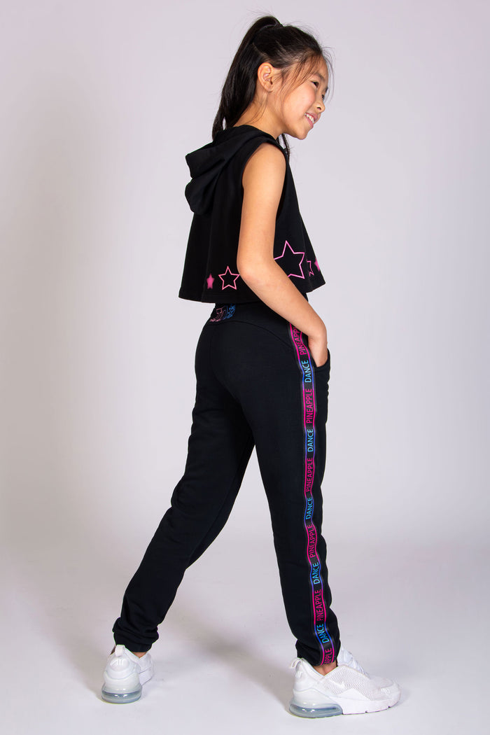 Girls' black cropped hoodie and matching joggers by Pineapple Dance Studios. Shop the latest The Next Step fashion!