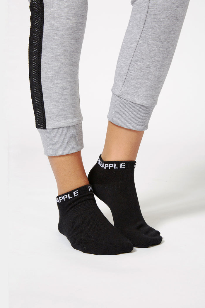 Woman wearing Black Ankle Socks with Logo
