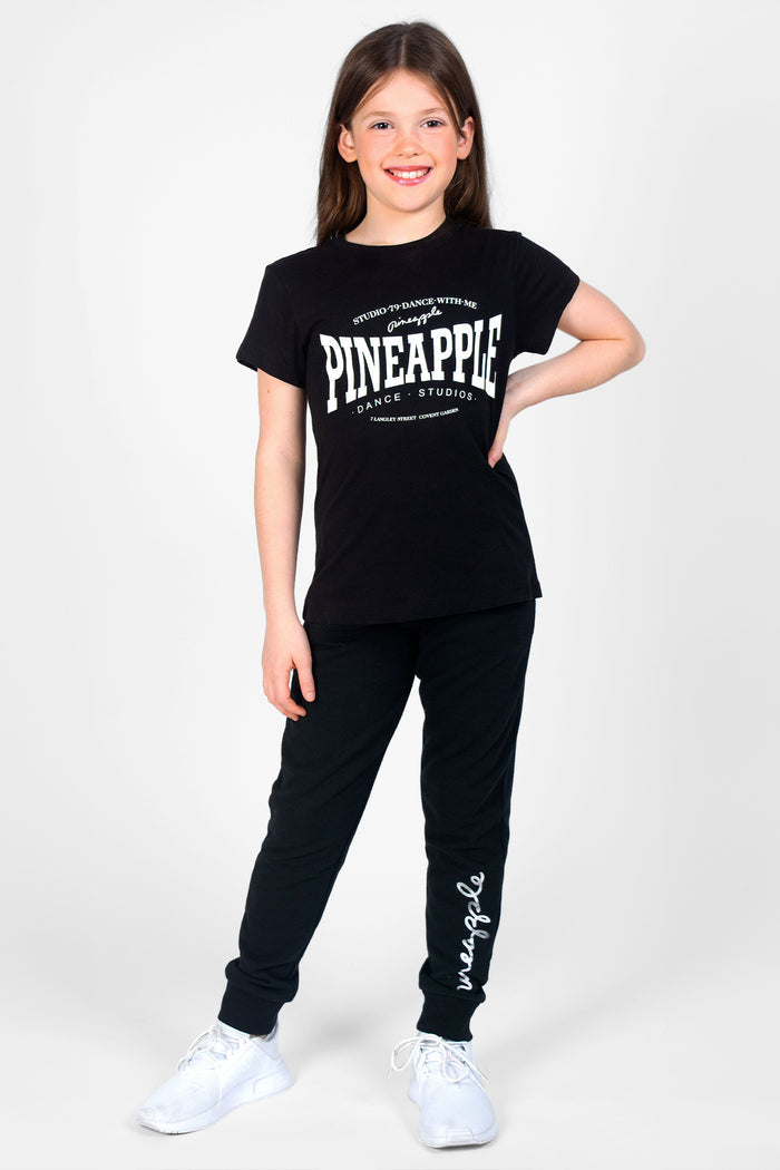 Girl's black t-shirt with 'survival of the fittest' logo chest print.