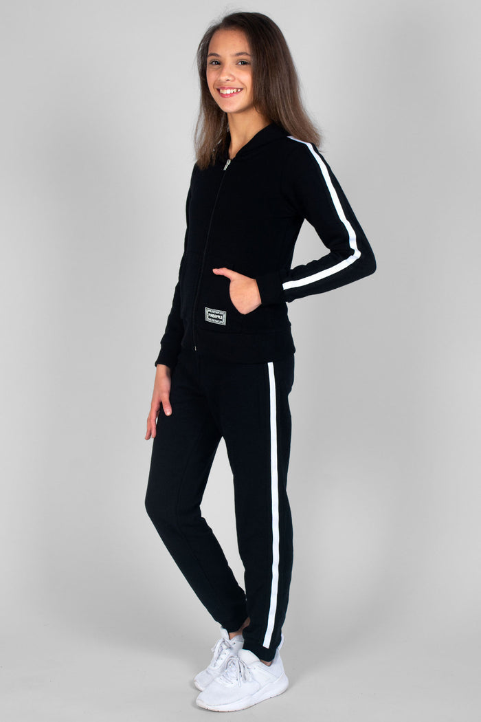 Girl wearing black Unisex Kids' Zip Jacket and matching Stripe Joggers with white stripes