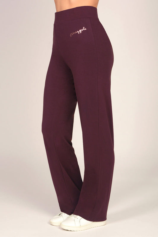 Women's maroon brown viscose jersey trousers on a white background