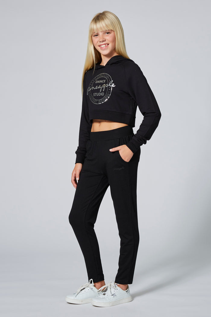 Girl wearing Black Viscose Trousers and cropped black hoodie