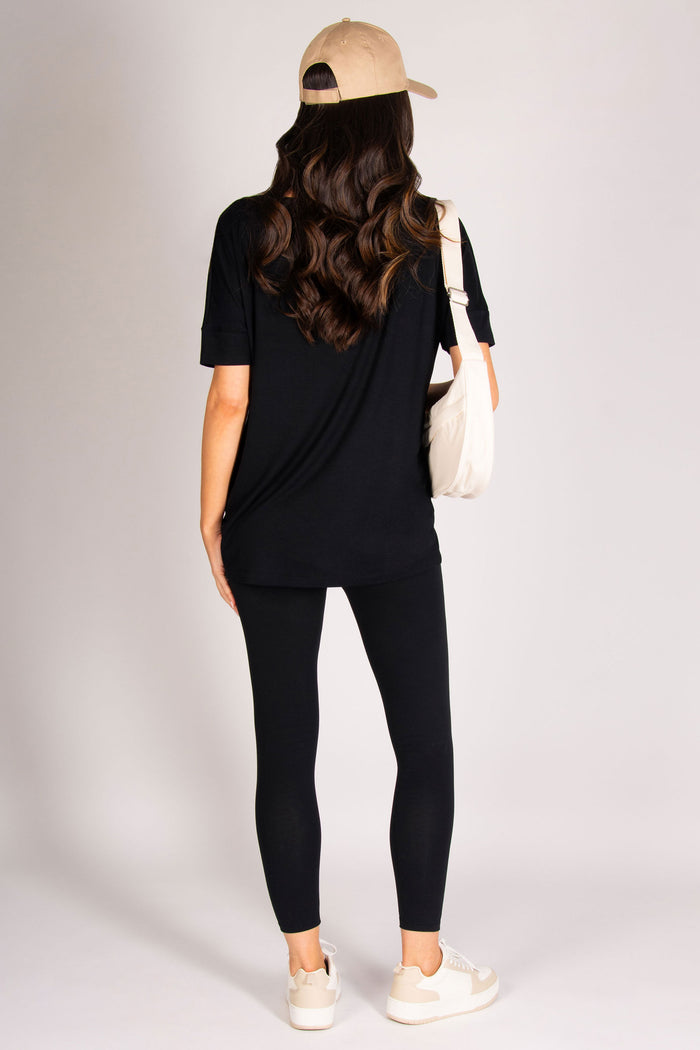 Women's black viscose short sleeve top with 7/8 leggings and sports cap